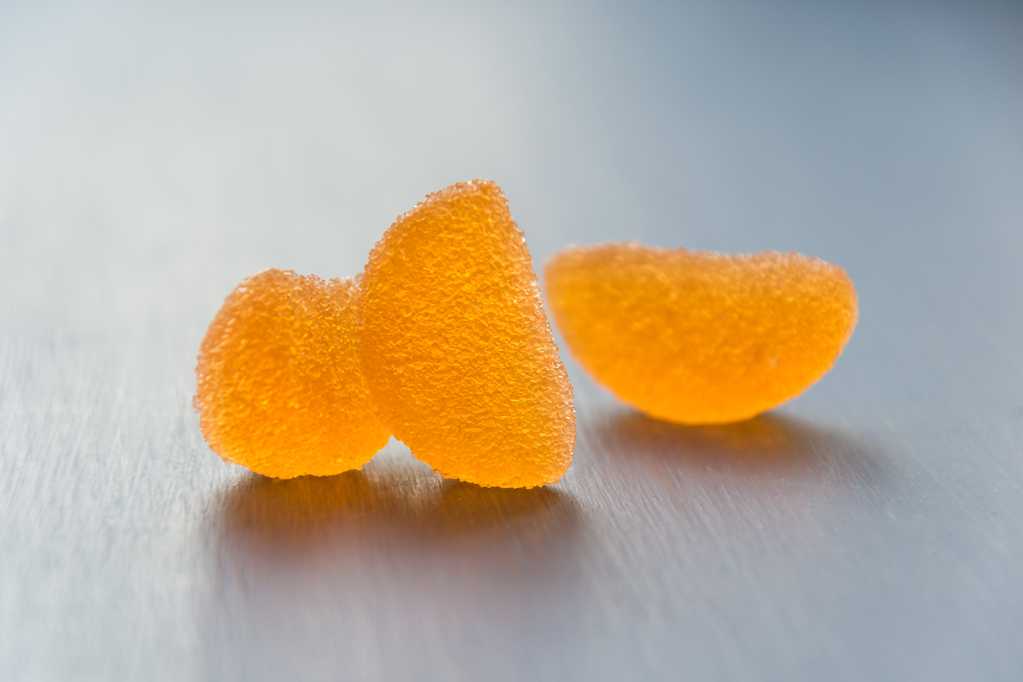 可口的橙色糖果图片