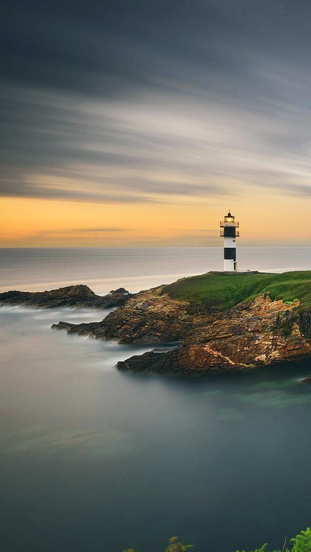 美丽的灯塔日落海洋iPhone 5壁纸