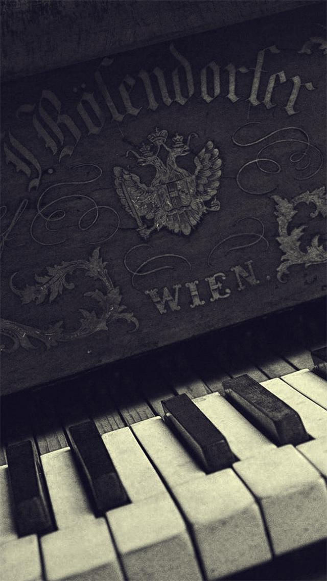 旧的钢琴键盘特写iPhone 5壁纸