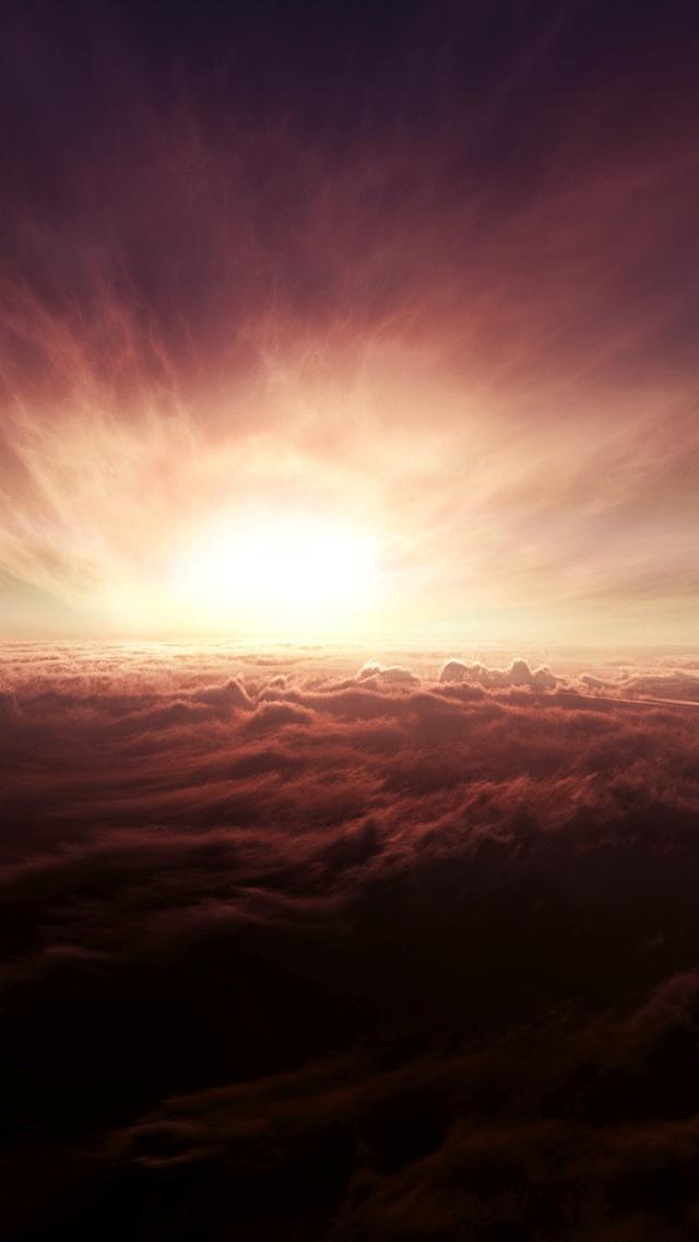 在云彩的日落iPhone 5墙纸