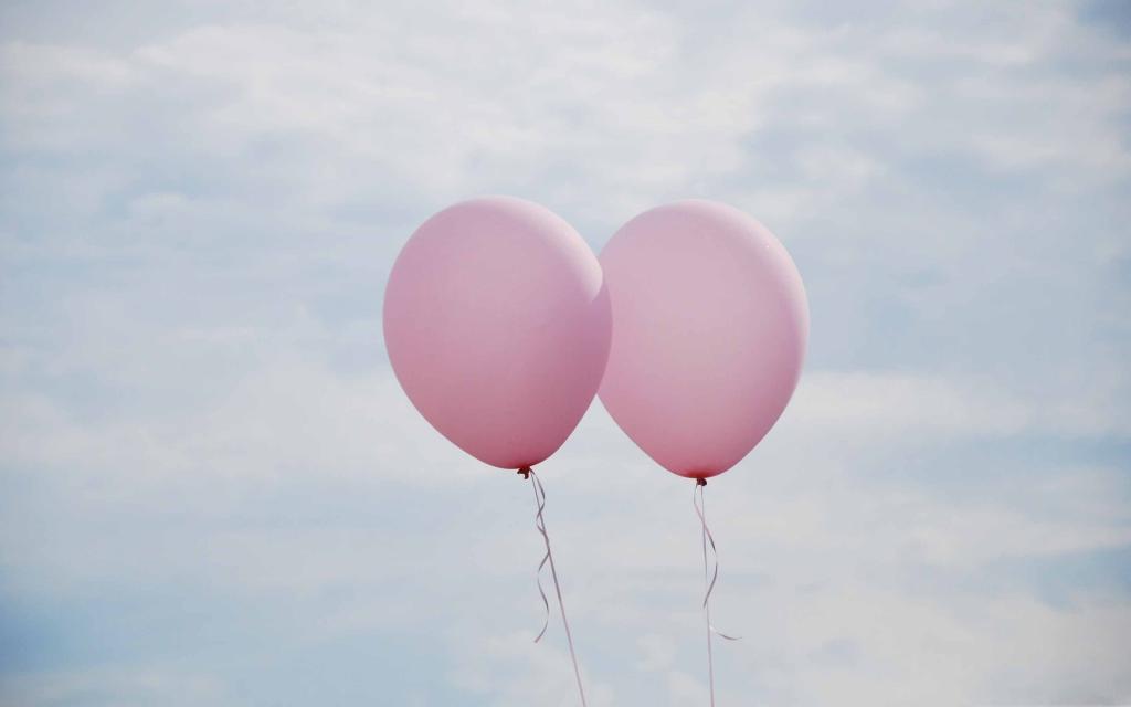 一起粉红色的气球Mac壁纸