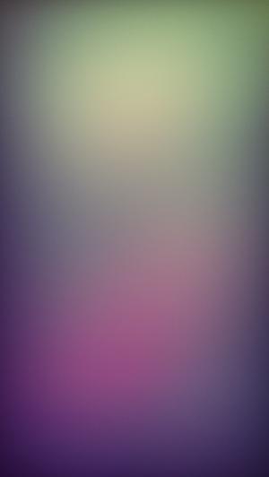 绿色到粉红色的iOS7模糊酷的iPhone 5壁纸