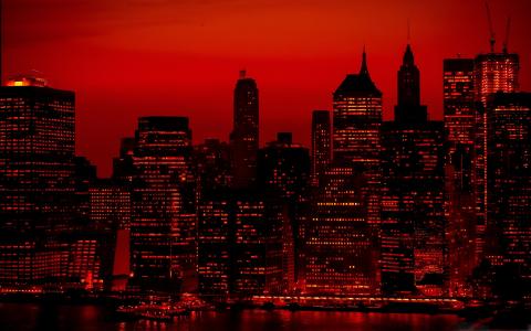 红色的天空在晚上纽约市Mac壁纸