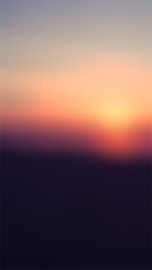 模糊的海滩夕阳光iPhone 5壁纸