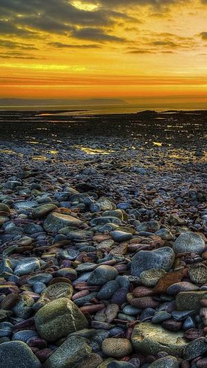 海滩岩日落HDR iPhone 6壁纸