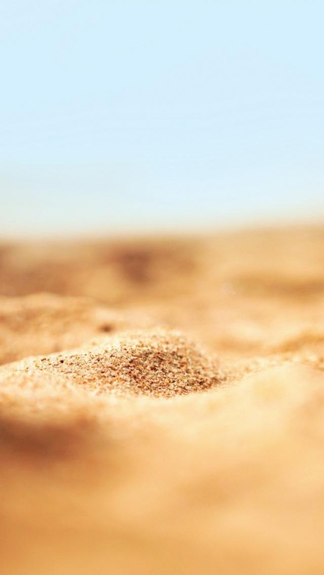 海滩沙关闭倾斜移动iPhone 5壁纸