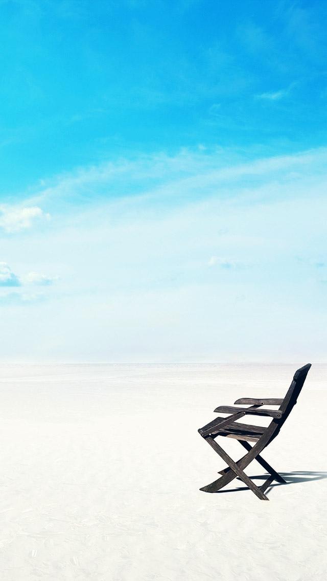 异国海滩iPhone 5壁纸上的椅子