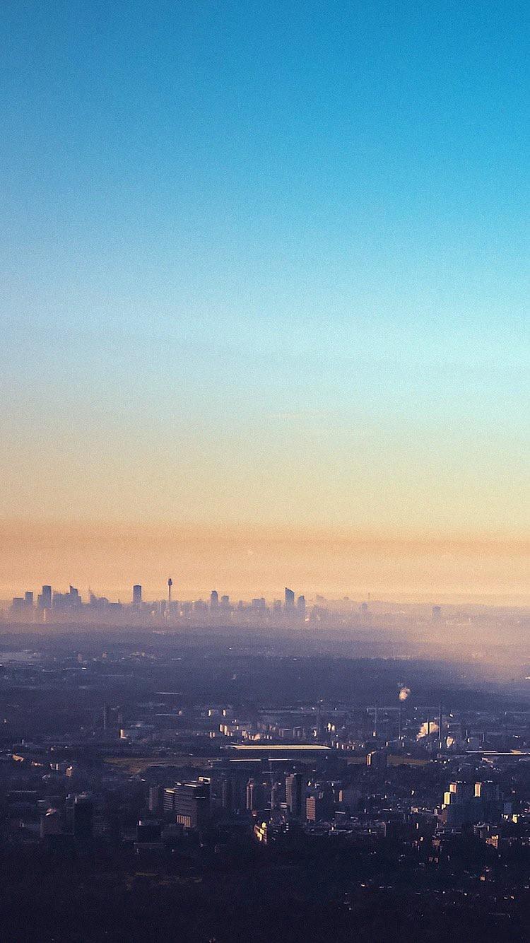 清除城市大都会iPhone 6的蓝色天空早晨薄雾墙纸